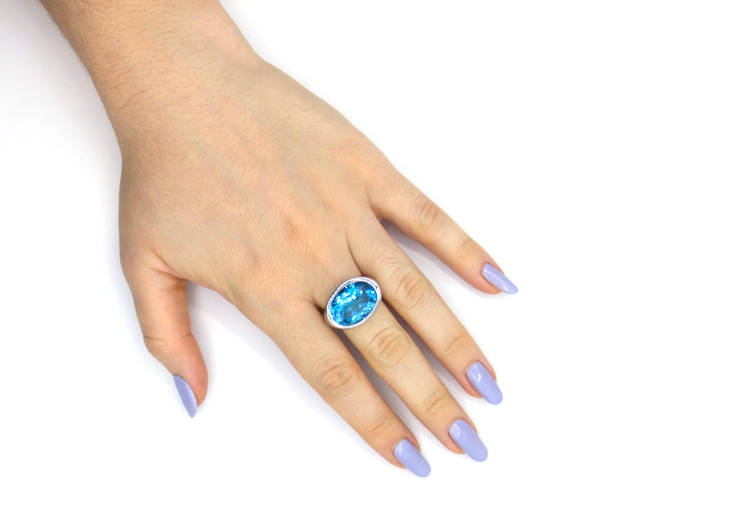 Modern 12 CT Blue Topaz Ring