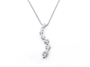 Graduating 7 Diamond Wave Pendant Necklace