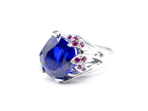 Blue Mystery Stone and White Gold Claw Ruby Accented Ring